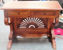 Mahogany two drawer side table, with carved Aboriginal style decoration