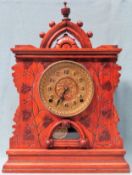 Vintage heavily carved Black Forest style mantle clock with gilt dial. App. 44cm H