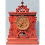 Vintage heavily carved Black Forest style mantle clock with gilt dial. App. 44cm H