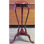 20th century carved mahogany tripod plant stand with piercework decoration. App. 85cm H