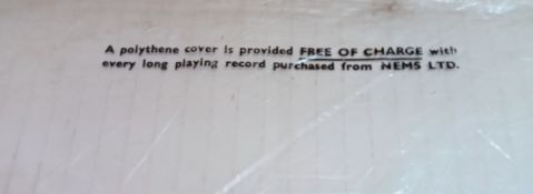 NEMS Ltd polythene record sleeve features wording printed at top of sleeve “A polythene cover is