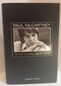Barry Miles Many Years From Now signed on inside title page “All The Best! Paul McCartney”.