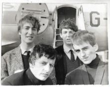 Original vintage photograph of The Beatles at Speke Airport, hand written on reverse “Beatles
