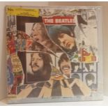 Three sealed UK original issue albums The Beatles Anthology 3, The Beatles 1, The Beatles Love.