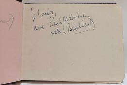 Autograph book containing a Paul McCartney signed “To Linda love Paul McCartney xxx (Beatles)”, with
