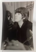 Two large format photographs of George Harrison taken Hamburg 26th June 1966 by Gerd Schulthess.