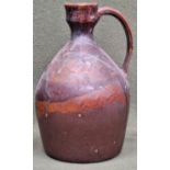 Glazed studio pottery jug, initialled TJM to base. App. 30cm H