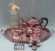 Parcelk of silver plated ware Inc. three piece tea set, two handled tray, cruet set, plus soda
