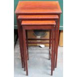 Early 20th century inlaid mahogany nest of three tables, plus rush seated stool