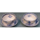 Two similar Oriental blue and white glazed ceramic tea bowls and saucers reasonable used condition