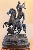 SPELTER FIGURE OF AN ARMOURED WARRIOR UPON WOODEN PLINTH, APPROX 57cm HIGH