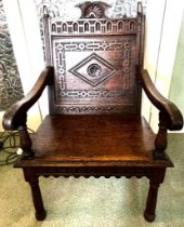 19TH CENTURY CARVED OAK ARMCHAIR