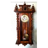 POLISHED WALNUT CASED VIENNA CLOCK, SPRING DRIVEN, APPROX 117cm HIGH AND 46cm WIDE AND 17.5cm DEEP