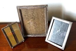 SILVER PLATED FRAMED (LEFT), ANOTHER UNHALLMARKED SILVER (CENTRE) AND HALLMARKED FRAME (RIGHT)