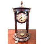 WOODEN MANTLE CLOCK SUPPORTED BETWEEN FOUR COLUMNS, APPROX 32.5cm HIGH