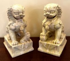 PAIR OF CARVED GREEN VEINED MARBLE DOGS OF FO, APPROX 28cm HIGH