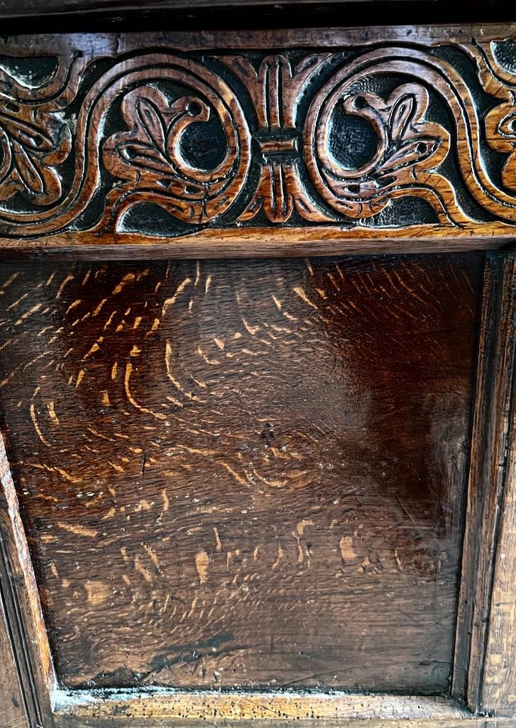 ANTIQUE OAK THREE PANEL CHEST UPON STILE SUPPORTS, DATE 1716 CARVED INTO FRONT PANEL, APPROX 73cm - Image 3 of 4