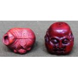 Two hand carved Oriental treen Netsukes both used