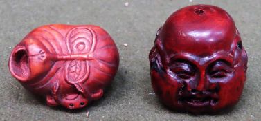Two hand carved Oriental treen Netsukes both used