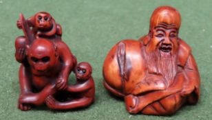 Two hand carved Oriental treen Netsukes, one signed both used condition