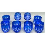 Set of 6 blue overlaid glass tumblers, plus two stemmed similar glasses reasonable used condition