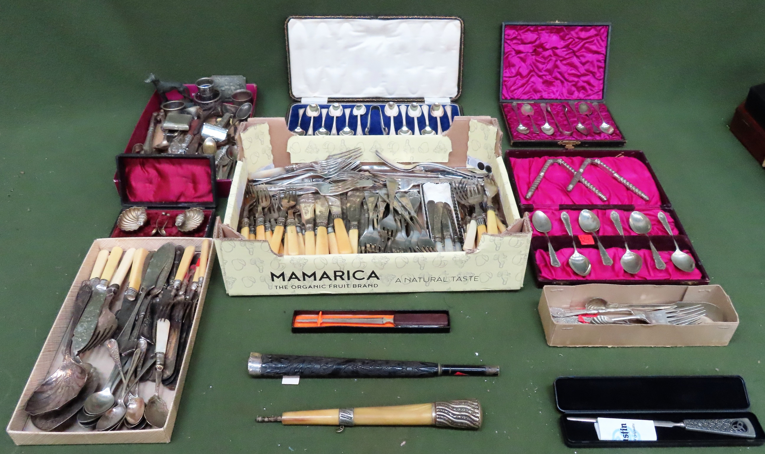 Large quantity of boxed and unboxed silver plated flatware, two old mounted stick handles etc all