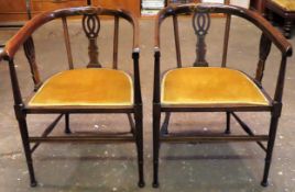 Pair of Edwardian inlaid mahogany tub style armchairs, on stretchered supports. Approx. 78 x 53 x