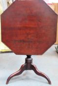 Antique oak tilt top table on tripod supports. Approx. 69cms H x 71cms W used with scuffs