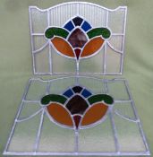Pair of vintage leaded and stained glass panels. Larger Approx. 39 x 51.5cms reasonable used