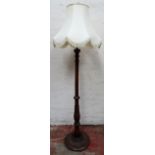 Early 20th century carved mahogany standard lamp with shade. Approx. 131cms H used condition not