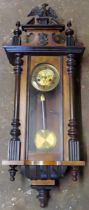 Early 20th century mahogany cased Vienna style wall clock with circular gilt dial. Approx. 105cms