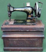 Vintage wooden cased Singer sewing machine used condition. not tested