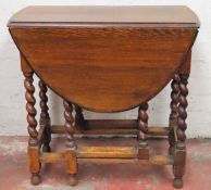 Early 20th century oak barley twist gateleg dining table. Approx. 74 x 76 x 102cms reasonable used