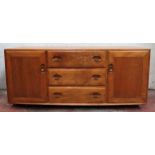 Ercol Golden Dawn three drawer sideboard. Approx. 69 x 155 x 43cms used with scuffs scratches and