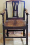Antique country style oak armchair. Approx. 91 x 59 x 44.5cms reasonable used condition with minor