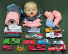 Armand Marseille vintage doll plus various diecast vehicles for restoration