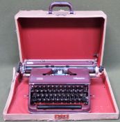 Cased vintage Olympia typewriter used not tested, box damaged