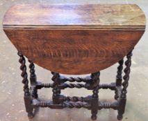 Early 20th century barley twist oak gateleg table. Approx. 67 x 83 x 71cms reasonable used condition