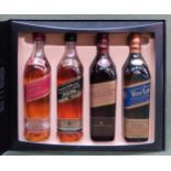 Boxed Johnnie Walker 'The Collection' of four bottles appears reasonable used condition