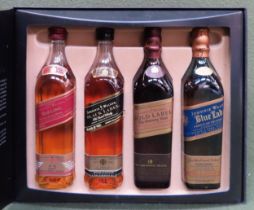 Boxed Johnnie Walker 'The Collection' of four bottles appears reasonable used condition