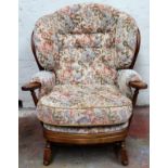 Ercol country style dark oak upholstered armchair. Approx. 89 x 83 x 64cms reasonable used condition