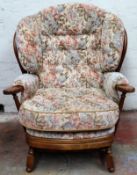 Ercol country style dark oak upholstered armchair. Approx. 89 x 83 x 64cms reasonable used condition