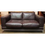 20th century Brown Leather two seater settee. App. 62cm H x 153cm W x 91cm D Reasonable used