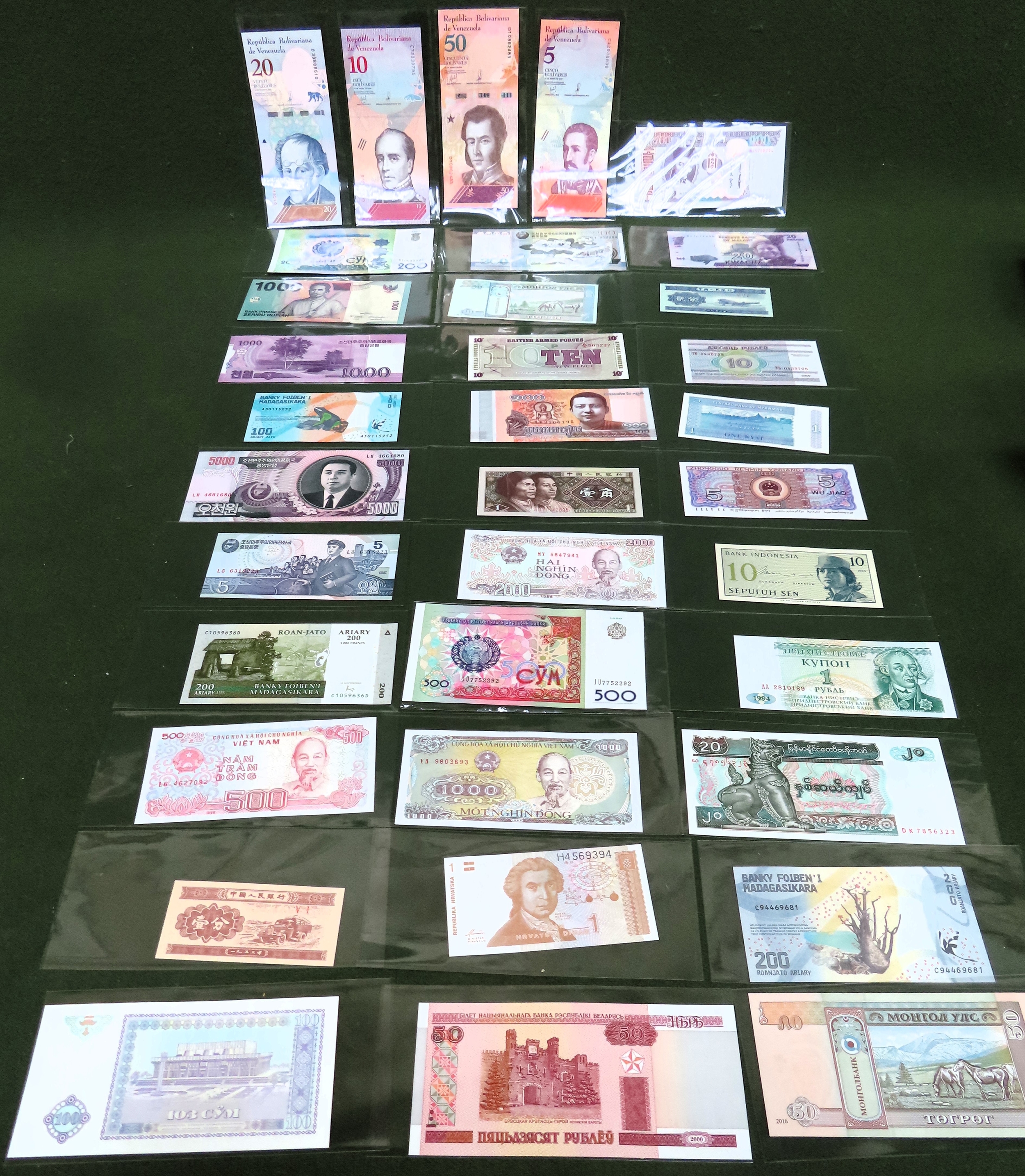 Selection of foreign banknotes Inc. Indonesia, Venezuela, British Armed Forces, Vietnam, etc all