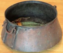 19th century copper two handled cooking pot with swing over handle. Approx. 25 x 41mcs used with