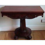 Victorian carved mahogany fold over tea table on quadrafoil supports. Approx. 73 x 92 x 90cms