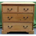 20th century stripped pine two over two chest of drawers. Approx. 92 x 98 x 45.5cms reasonable