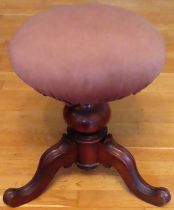 Victorian mahogany revolving piano stool on tripod supports reasonable used condition. one leg
