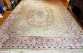 Large Chinese style floral decorated floor rug. Approx. 362 x 279cms used needs a clean frayed to