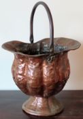 Vintage copper coal scuttle with swing over handle. Approx. 51 x 38cms used with wear due to age